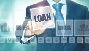 businessman selecting loan concept button